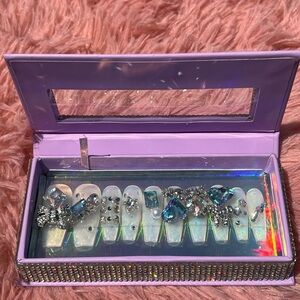 Blue on white bedazzled press on nails